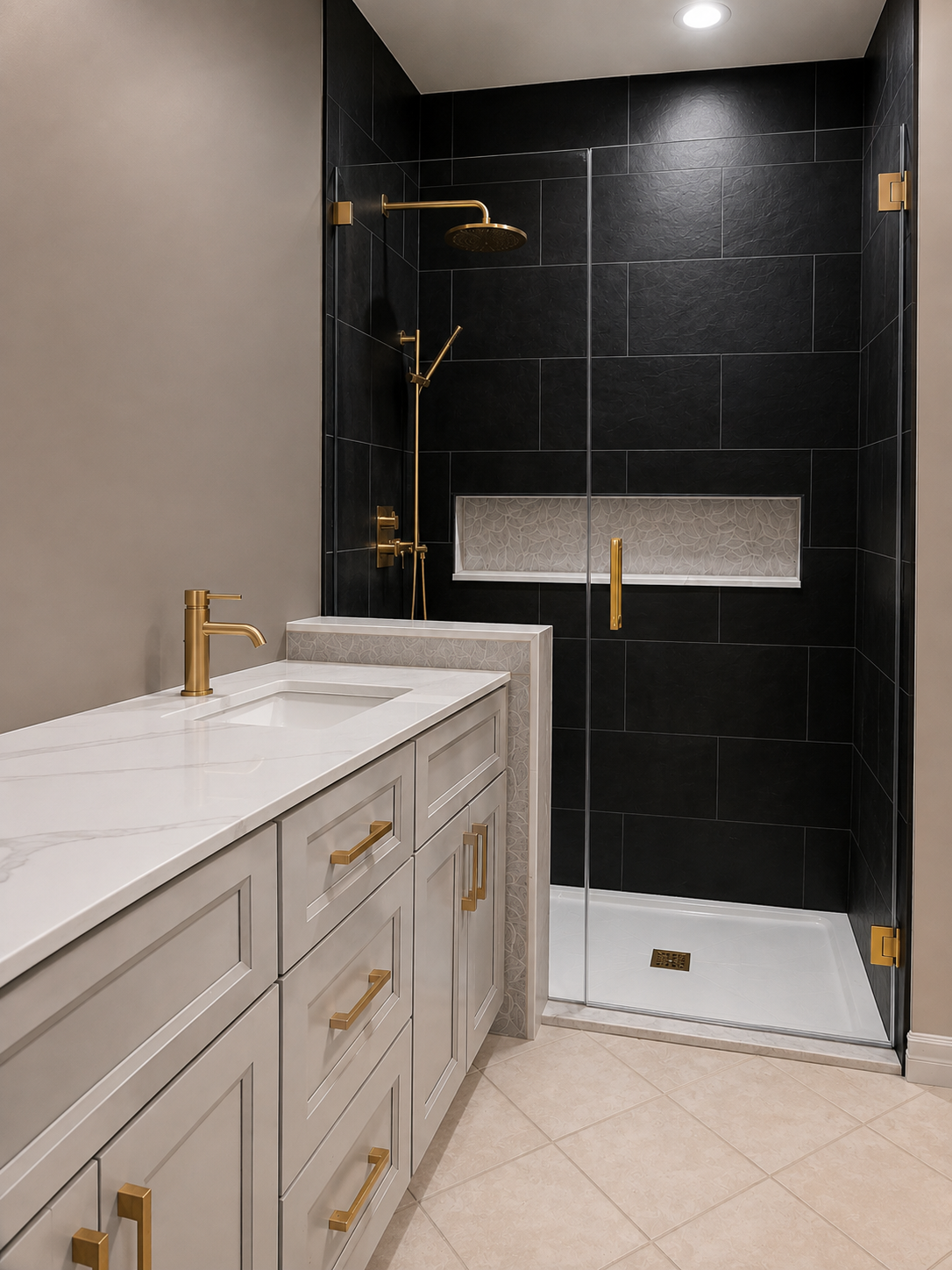 Finished bathroom with glass shower enclosure, black tile and brushed gold fixtures