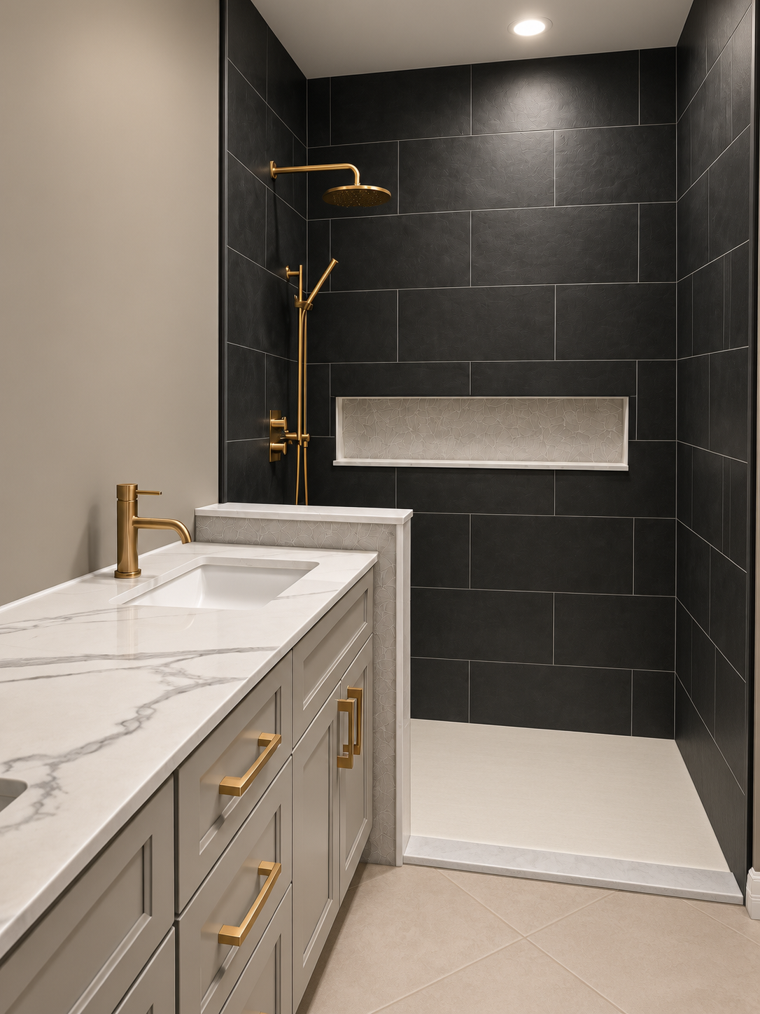 Finished black tile walk-in shower with light grey vanity and brushed gold fixtures