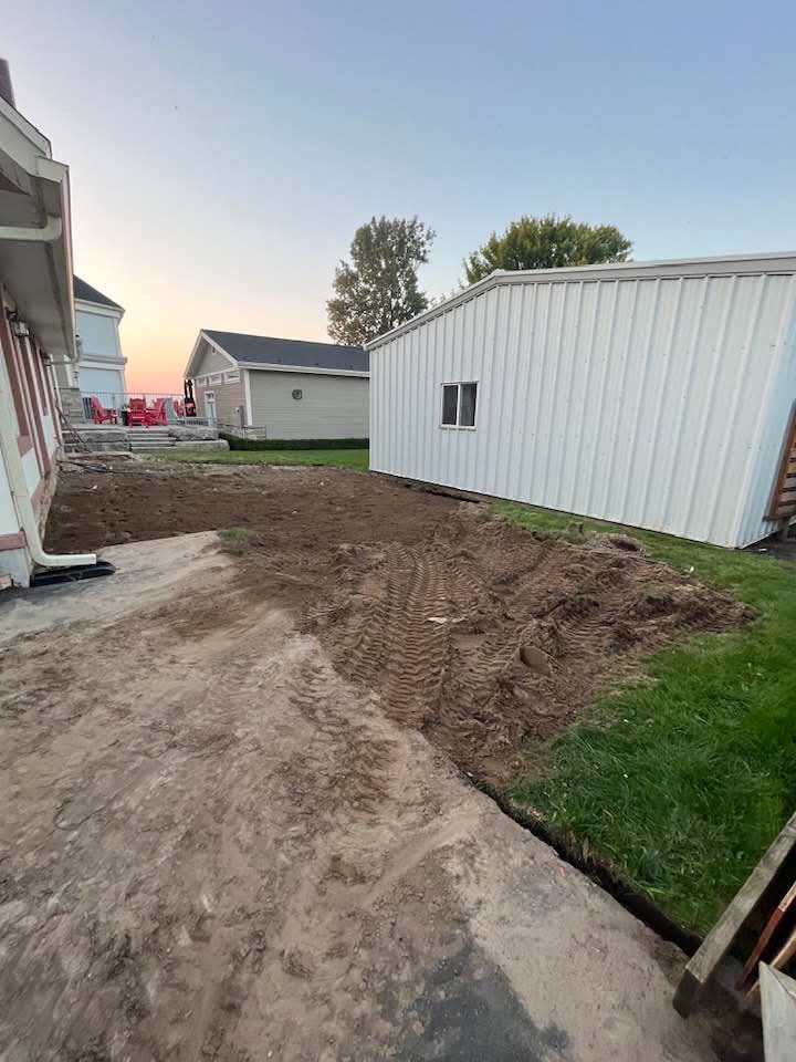 Yard graded and prepped before the new deck and fence build